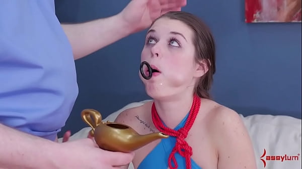 Leashed slut gagging on toy