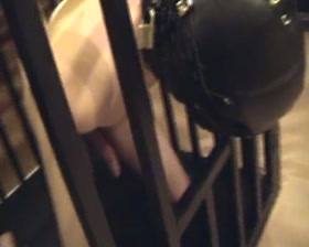 Caged slaveboy
