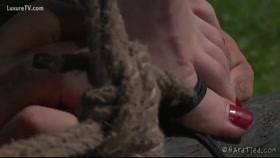 She screams and cries while being tied up