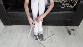 Bondage – Amber Devine Hogtied on Sofa
