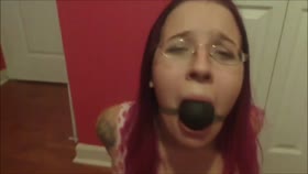 Ball gag and blowjob