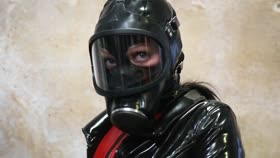 Restrained in Latex and Gasmask